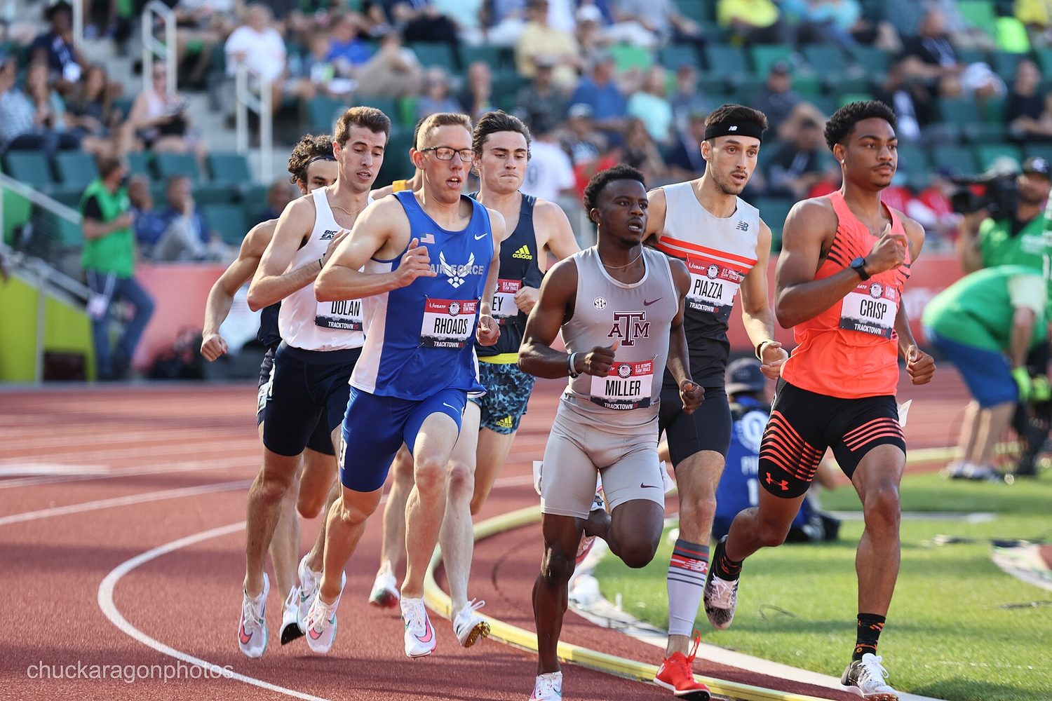 Athletes running on a track