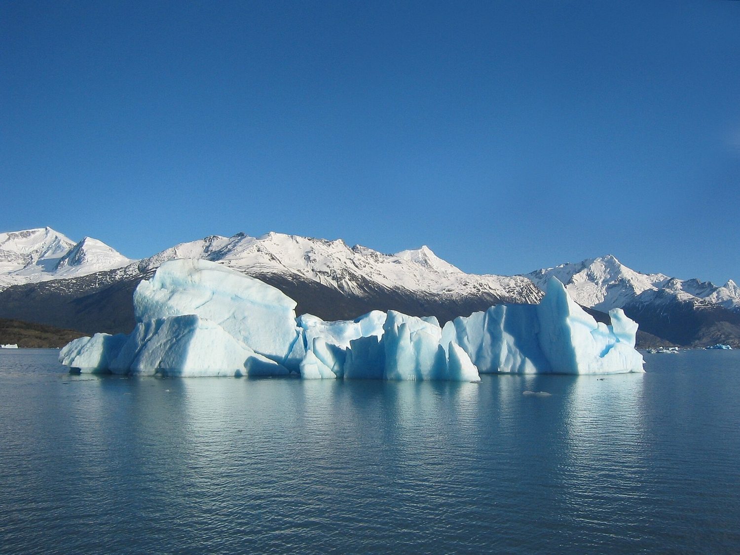 A large iceberg floating in the sea