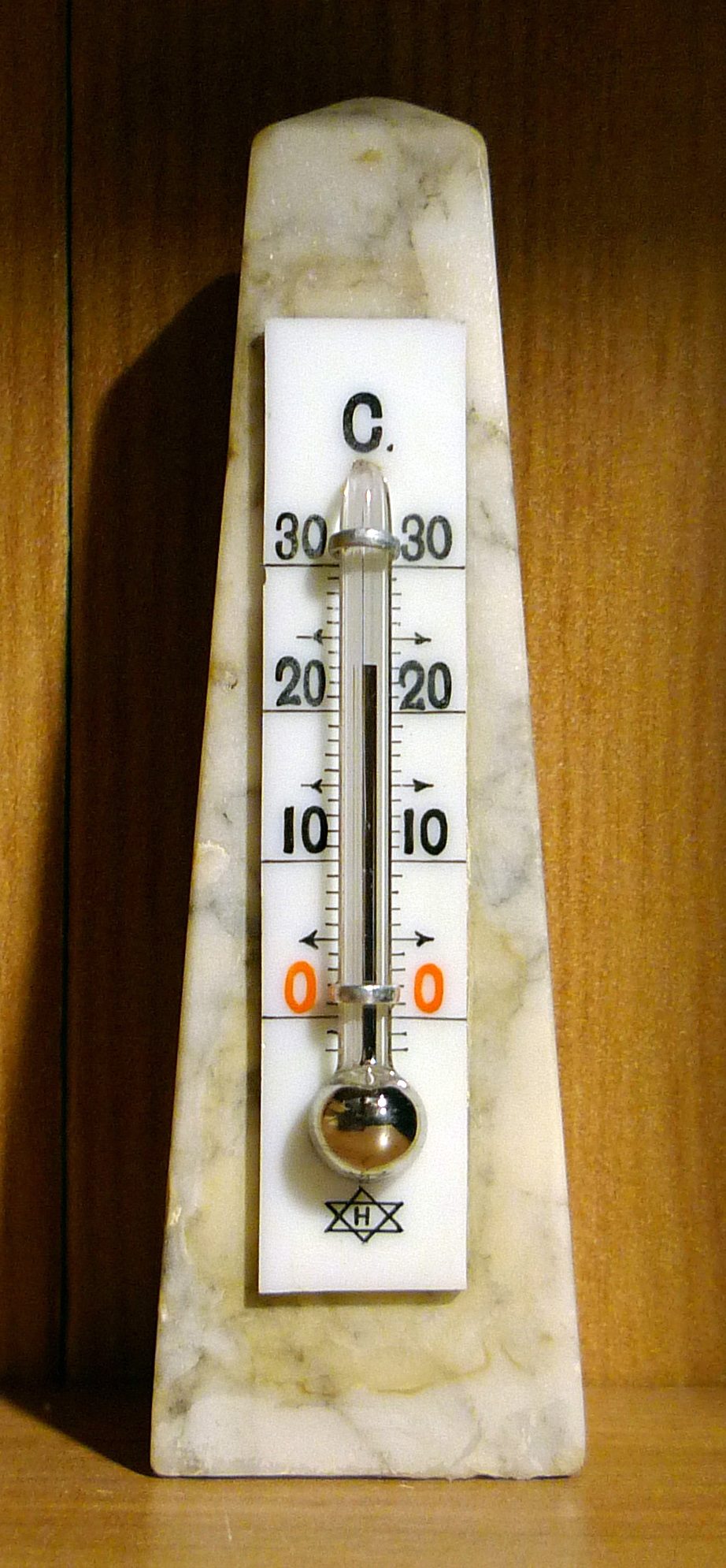 A mercury-in-glass thermometer