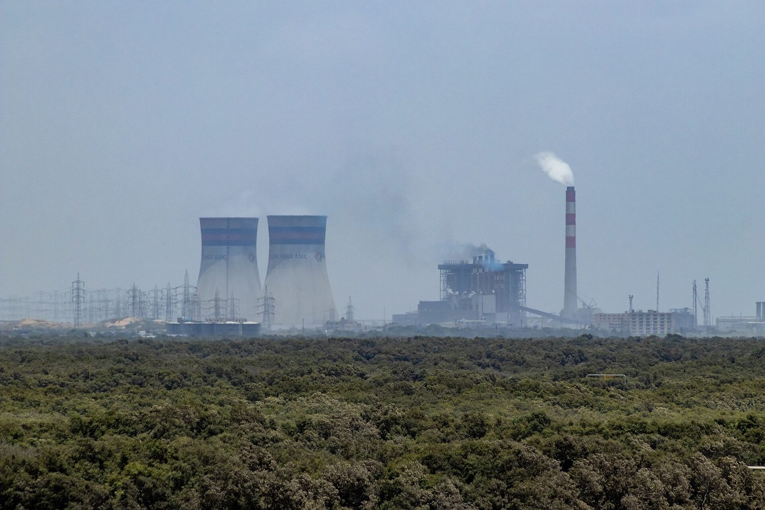 A power plant and industrial site: short-run aggregate supply depends on production costs