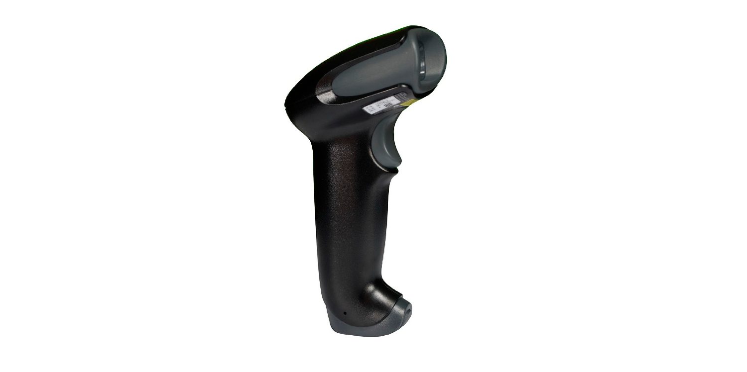 A handheld scanner in a stand, joined to a computer by a USB cable