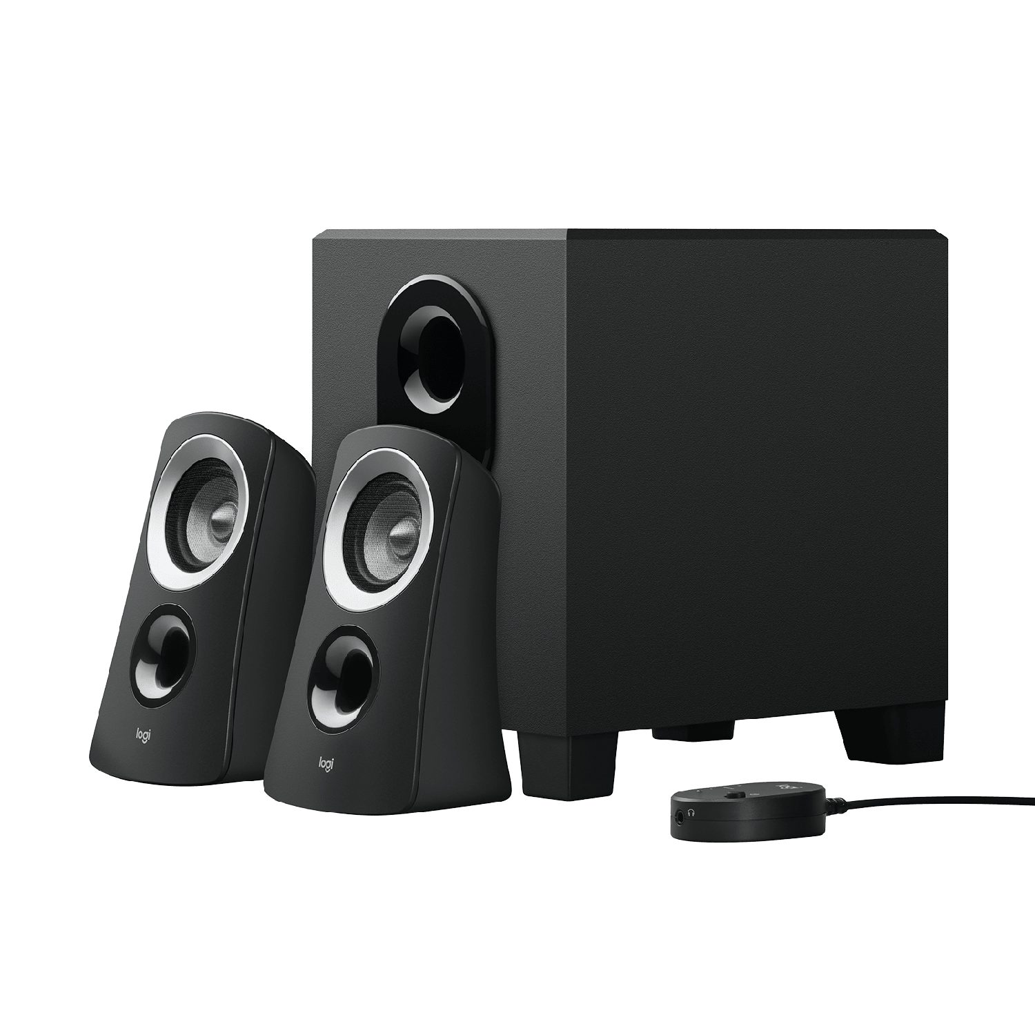 A pair of small black computer speakers on a desk