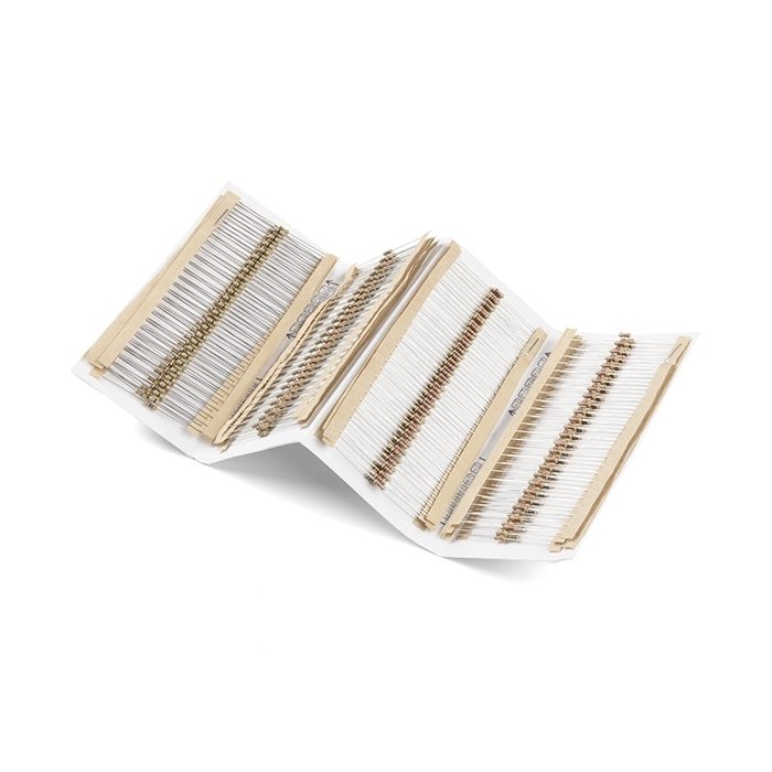 Rows of small resistors held in paper tape, each with coloured bands and two wire legs