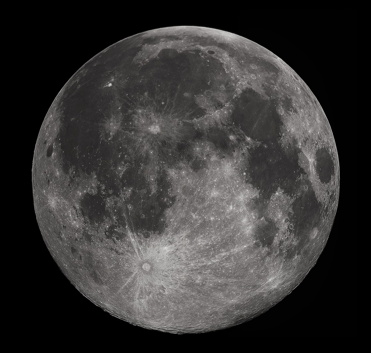 The full grey disc of the Moon, covered in dark patches and bright craters, against black space